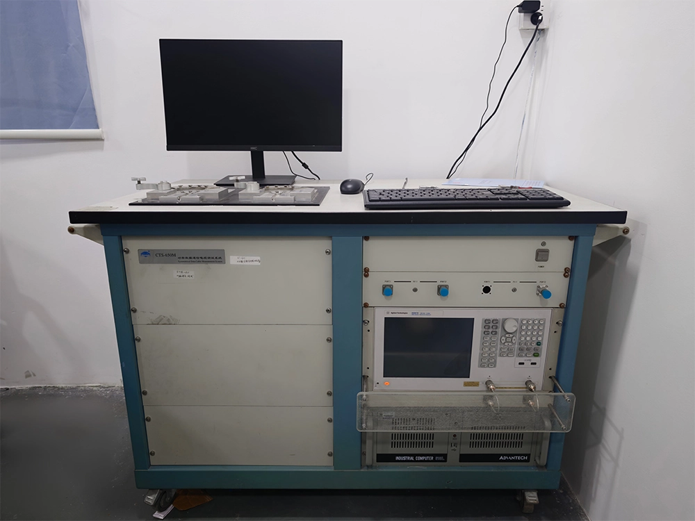 Cable test station with a monitor and test instruments used for cable performance testing
